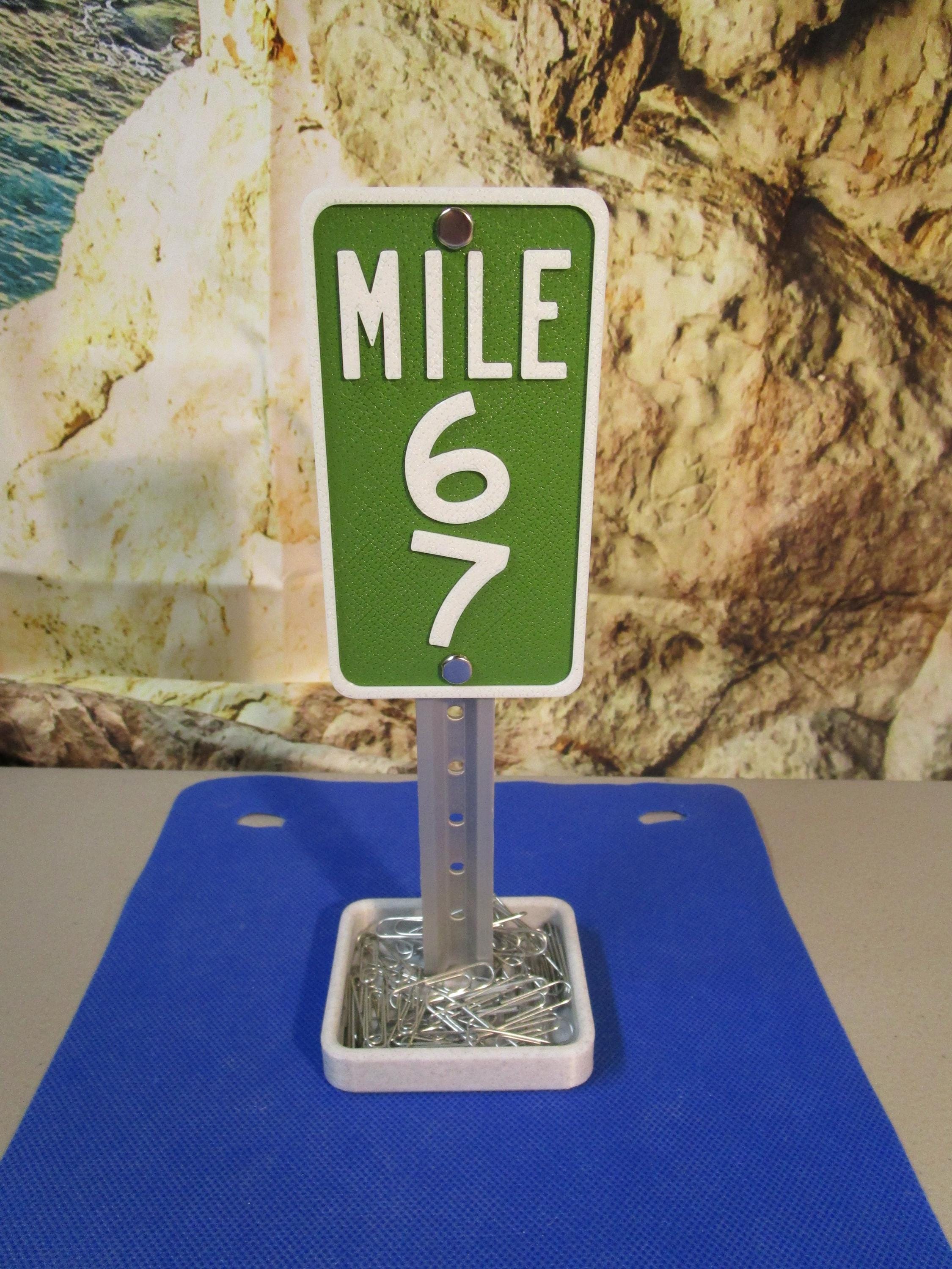 Mile 67 Desk Sign – Viral Meme Office Humor