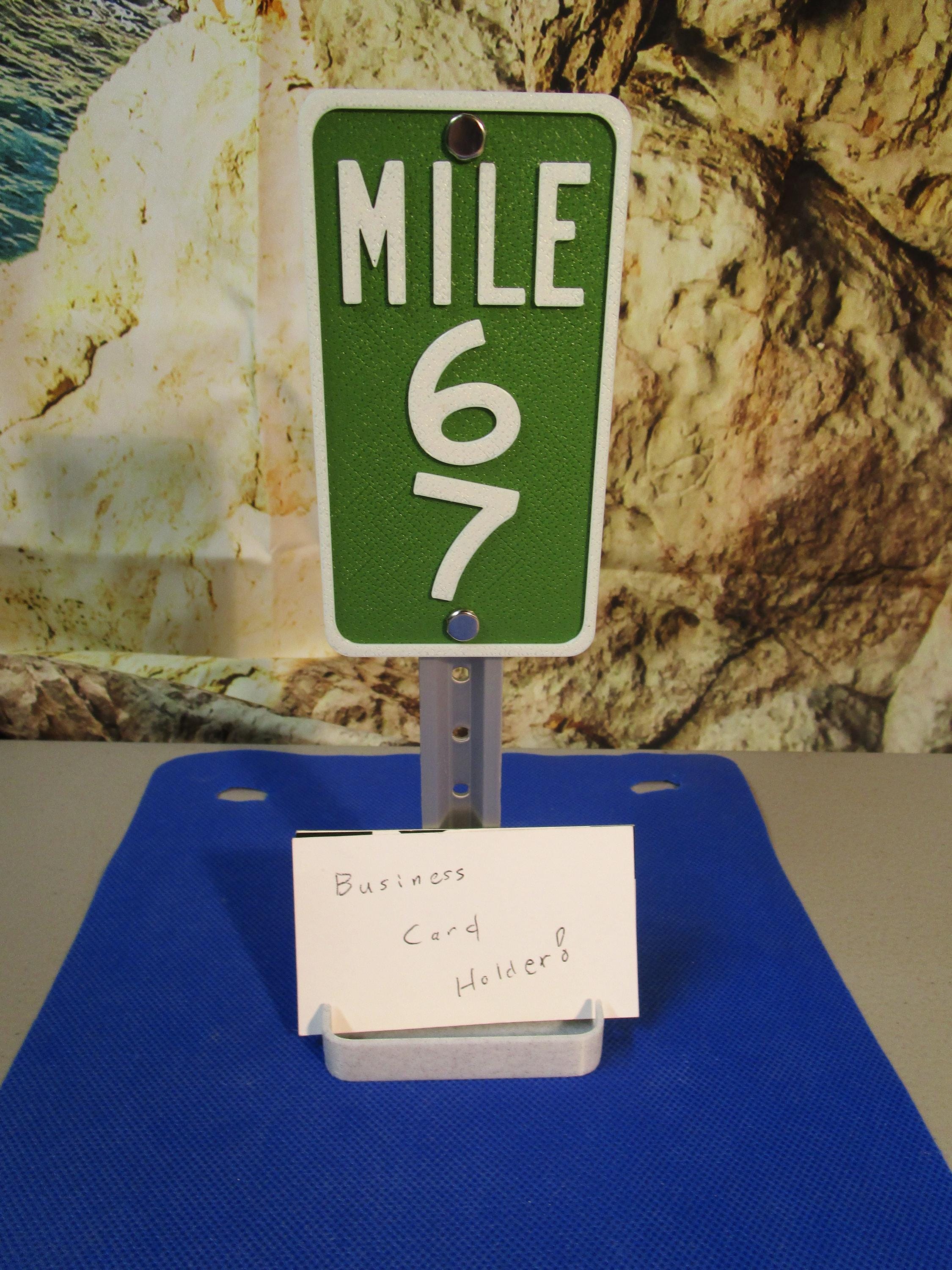 Mile 67 Desk Sign – Viral Meme Office Humor